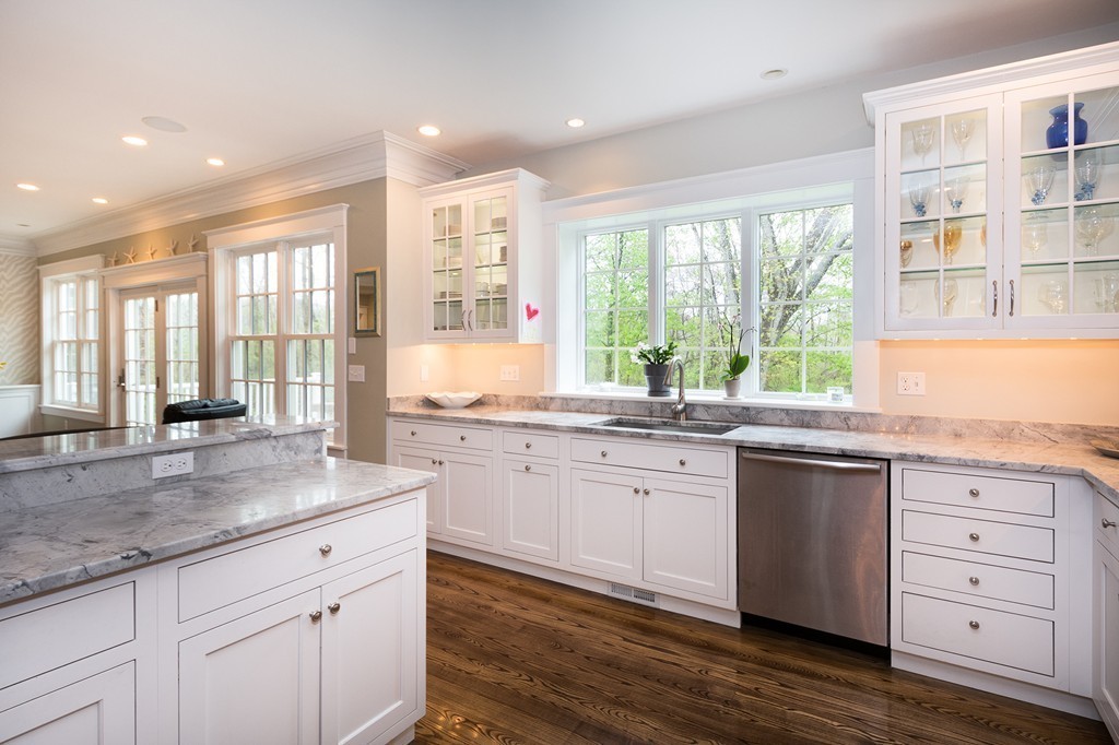 158 First Parish Road Scituate, MA 02066 - Photo 9 of 27 a kitchen with granite countertop white cabinets and sink