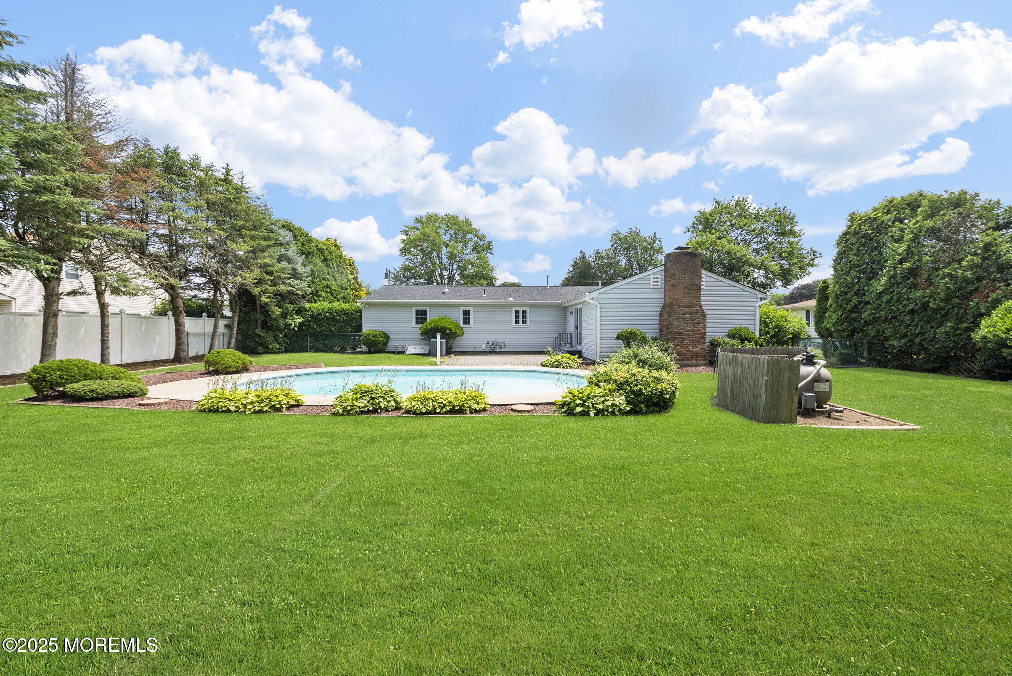 34 Traymore Road Freehold, NJ 07728 - Photo 3 of 23 a view of a house with a big yard potted plants and large tree