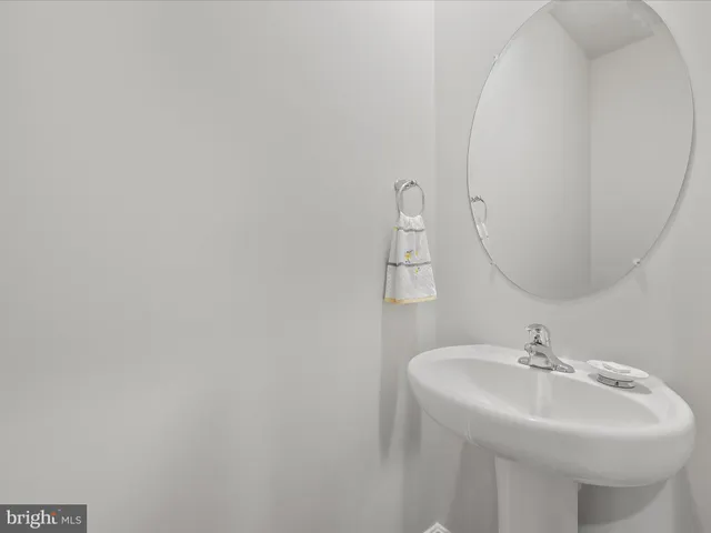 a kitchen with cabinets stainless steel appliances and a counter space