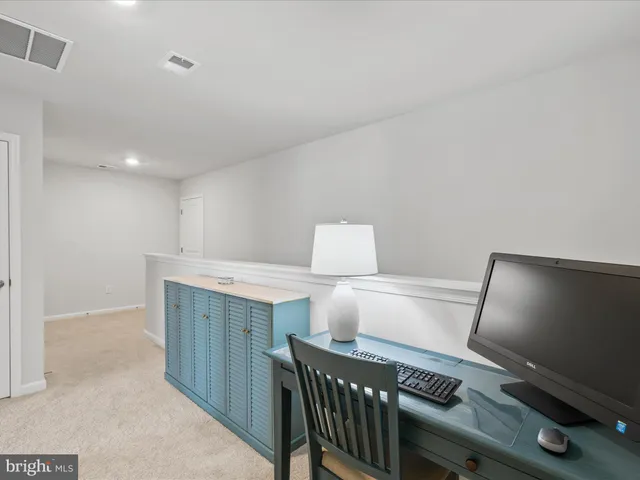 a view of workspace with furniture