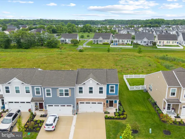 an aerial view of a house with a garden