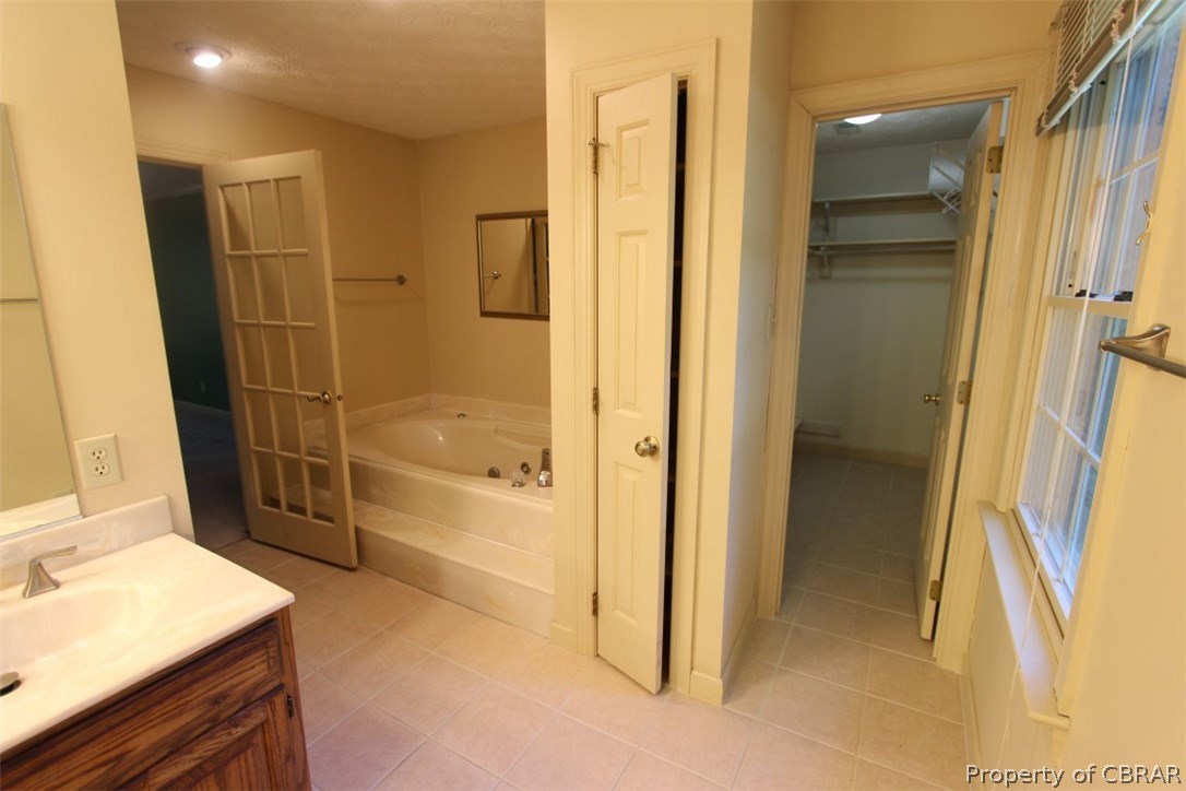 308 Tides Run Yorktown, VA 23692 - Photo 16 of 34 a bathroom with a shower and a sink