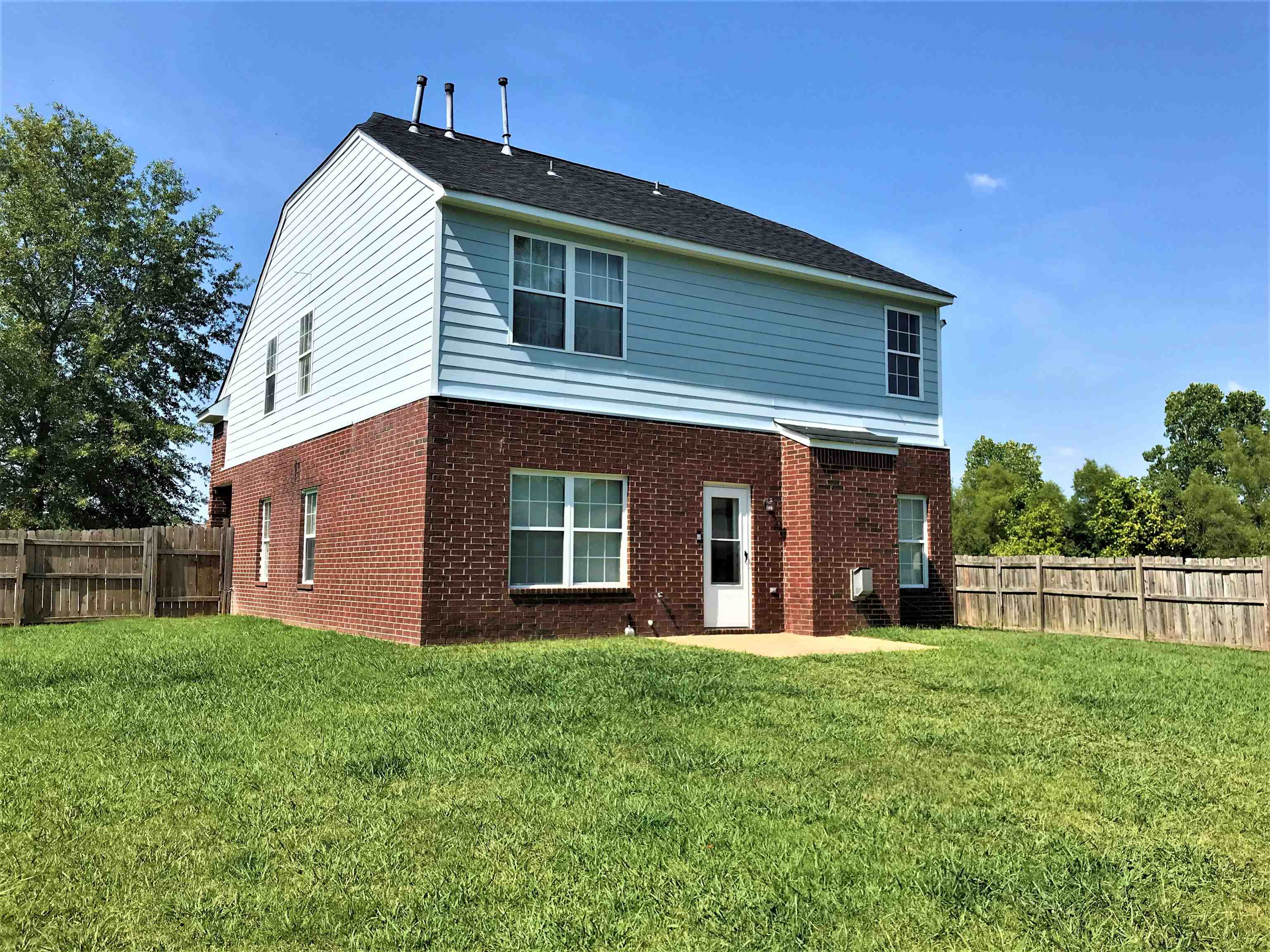 871 Ruby Creek Cove Memphis, TN 38109 - Photo 15 of 16 a front view of house with yard and green space