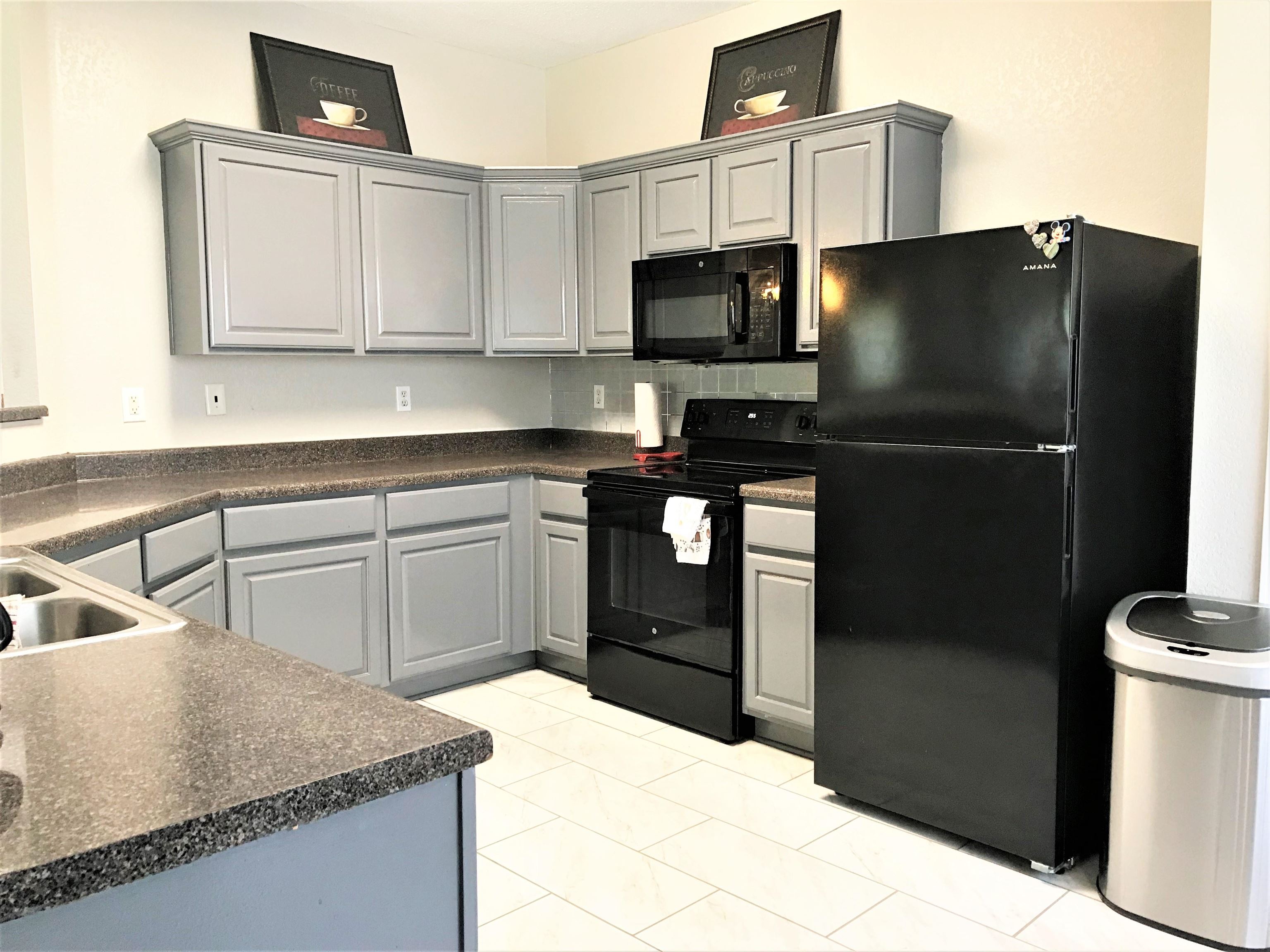 871 Ruby Creek Cove Memphis, TN 38109 - Photo 7 of 16 a kitchen with stainless steel appliances granite countertop a refrigerator a stove and a sink