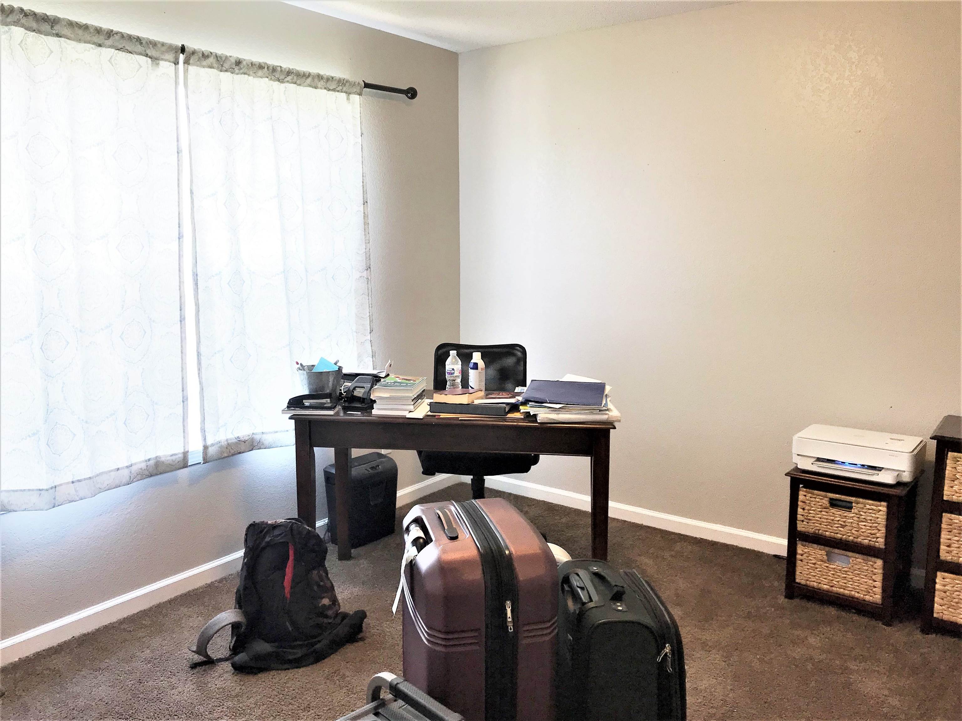871 Ruby Creek Cove Memphis, TN 38109 - Photo 9 of 16 a view of a workspace with furniture and a window