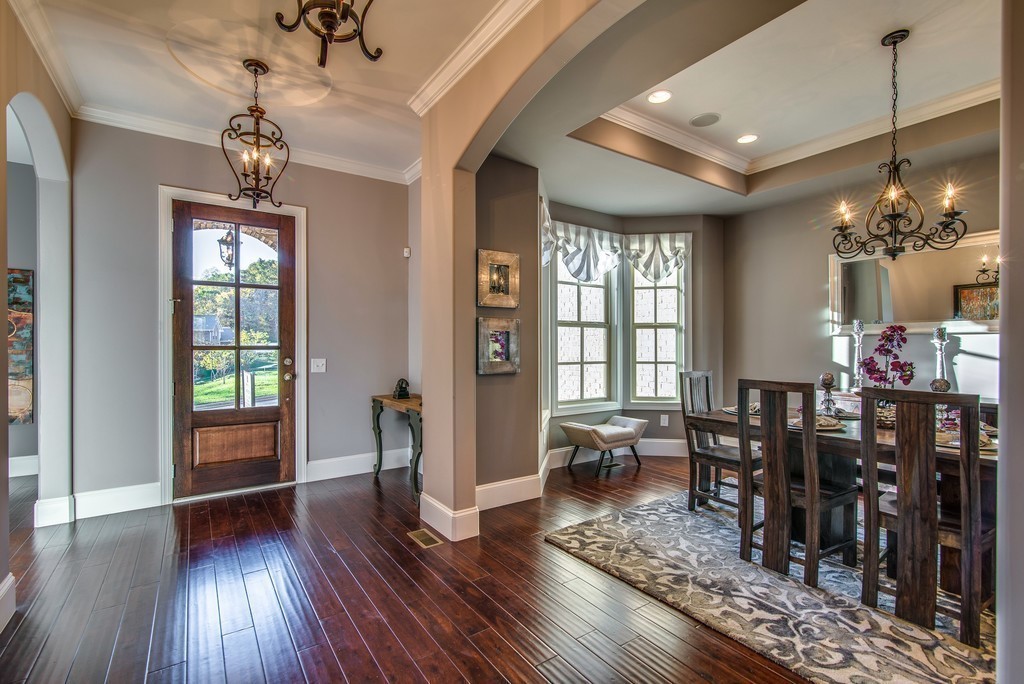 1026 October Park Way Franklin, TN 37067 - Photo 4 of 27 a view of a dining room with furniture window and wooden floor