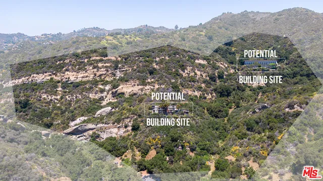 a view of a city with mountain