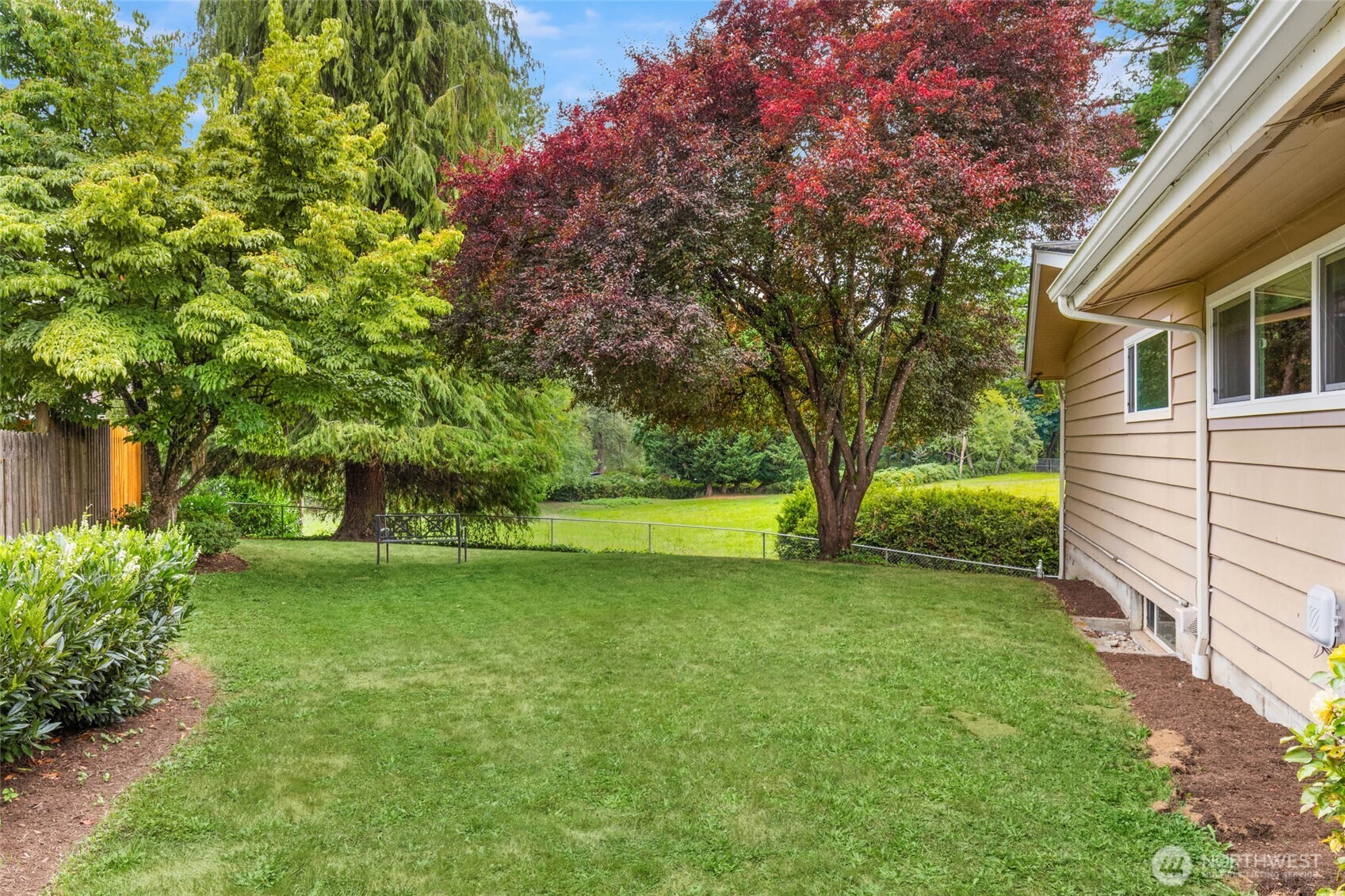 618 Riverview Drive Monroe, WA 98272 - Photo 27 of 39 a view of a backyard with large trees