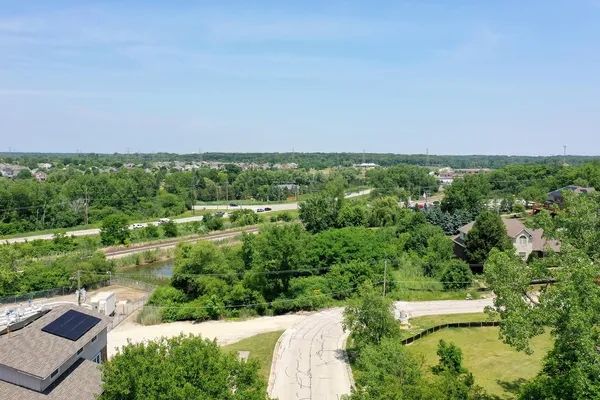 an aerial view of a city with lots of residential buildings