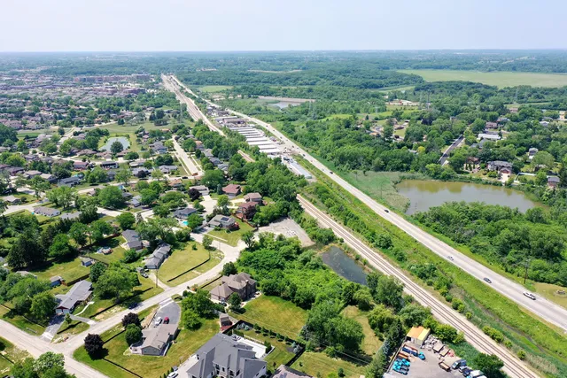 a view of a city street view with houses