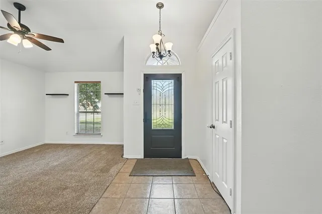 a view of an entryway with a window