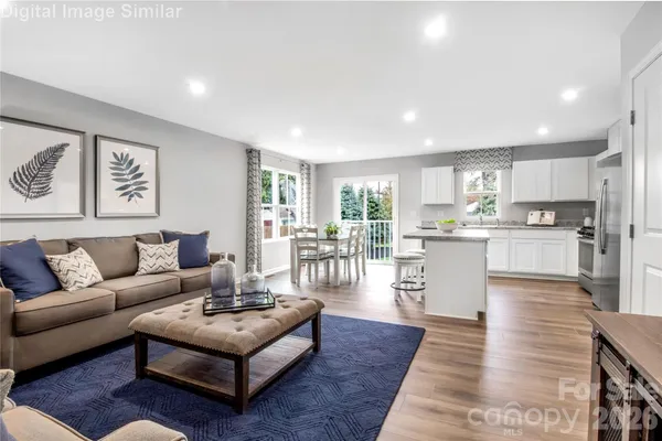 a view of a street with a building in the background