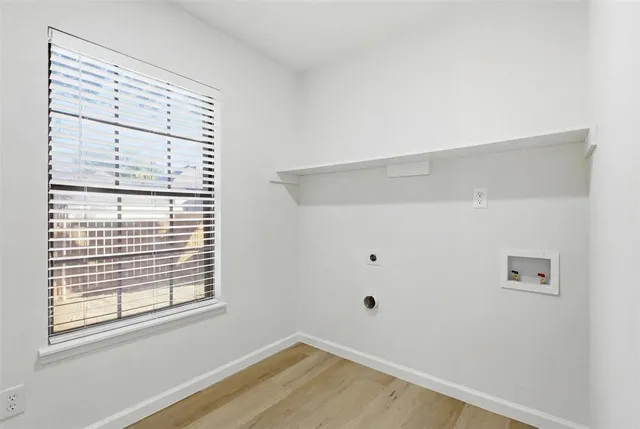 a view of a room that has a window in it