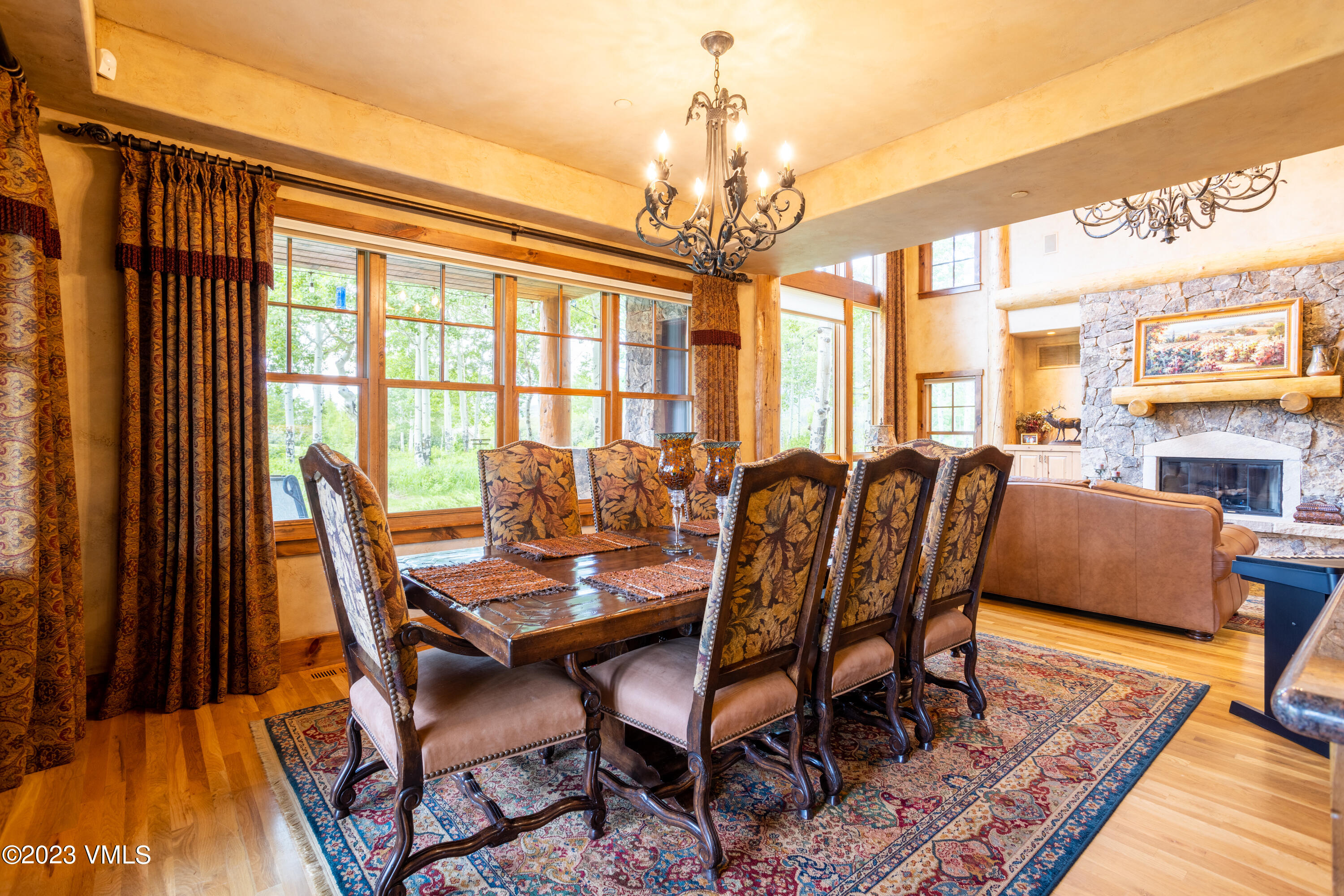67 Cimarron Trail Edwards, CO 81632 - Photo 11 of 51 a view of a dining room with furniture wooden floor and chandelier