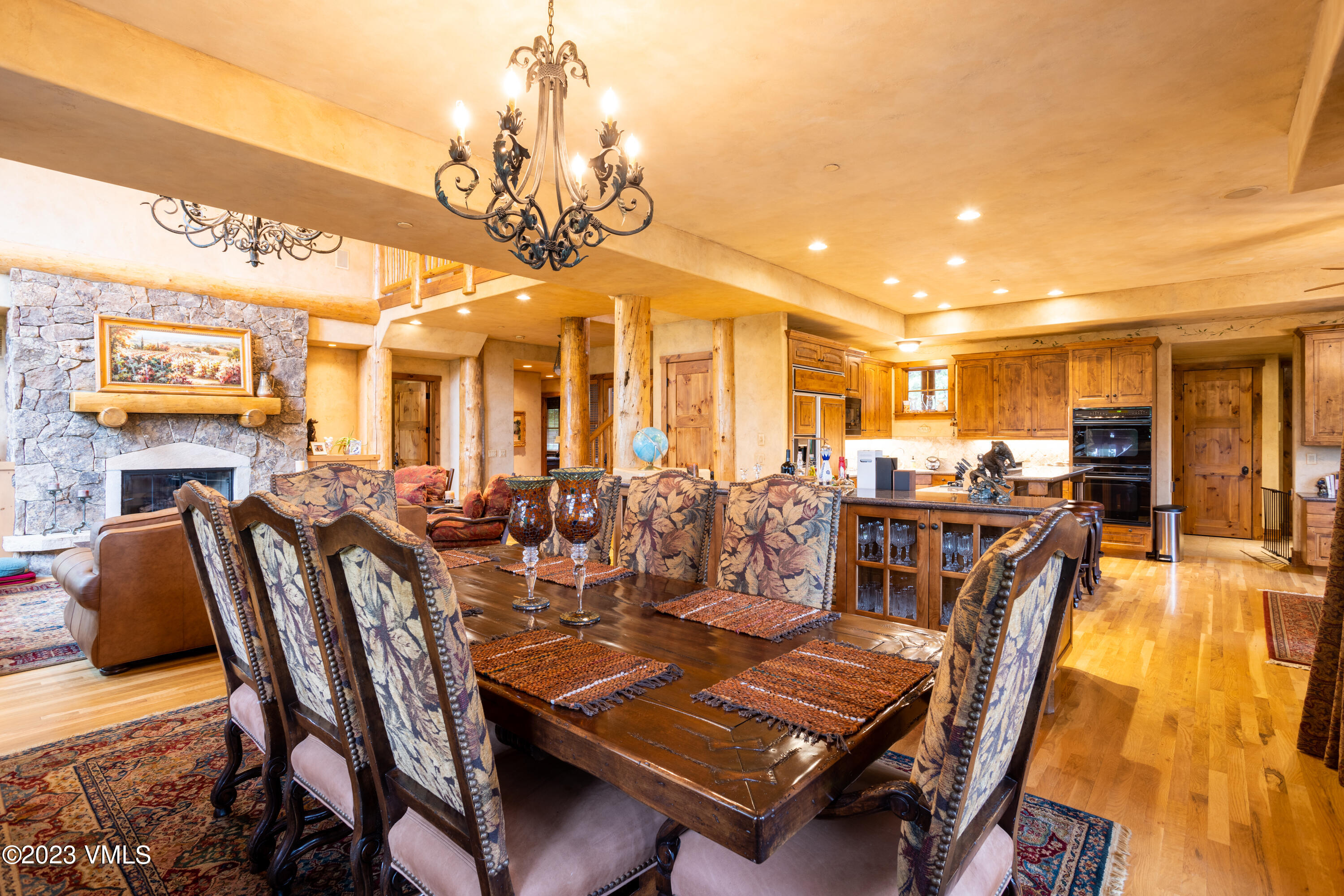 67 Cimarron Trail Edwards, CO 81632 - Photo 12 of 51 a view of a dining room with furniture and wooden floor
