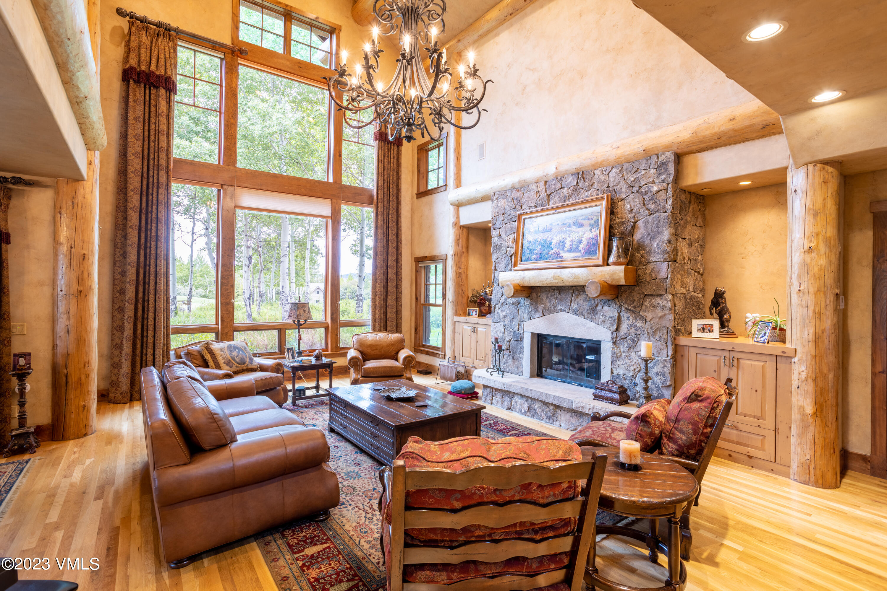 67 Cimarron Trail Edwards, CO 81632 - Photo 16 of 51 a living room with fireplace furniture and a large window