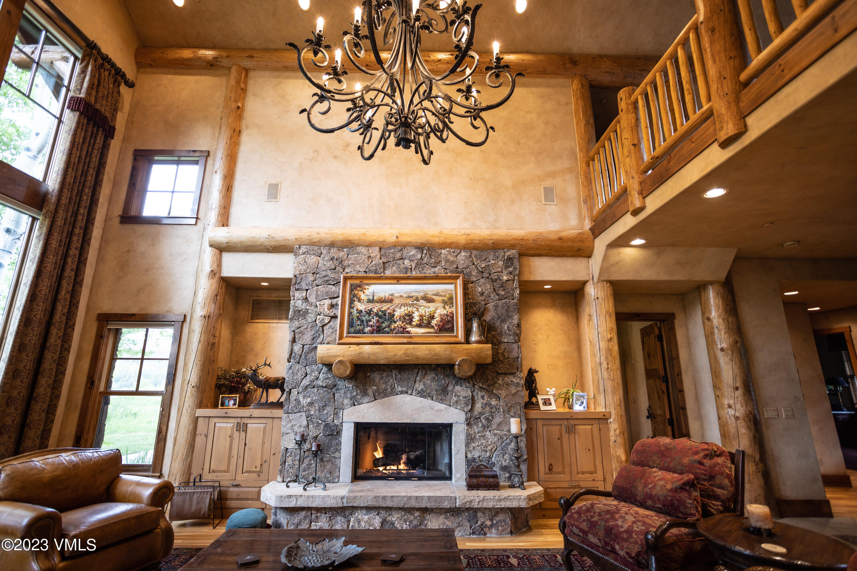 67 Cimarron Trail Edwards, CO 81632 - Photo 19 of 51 a living room with furniture a fireplace and a large window