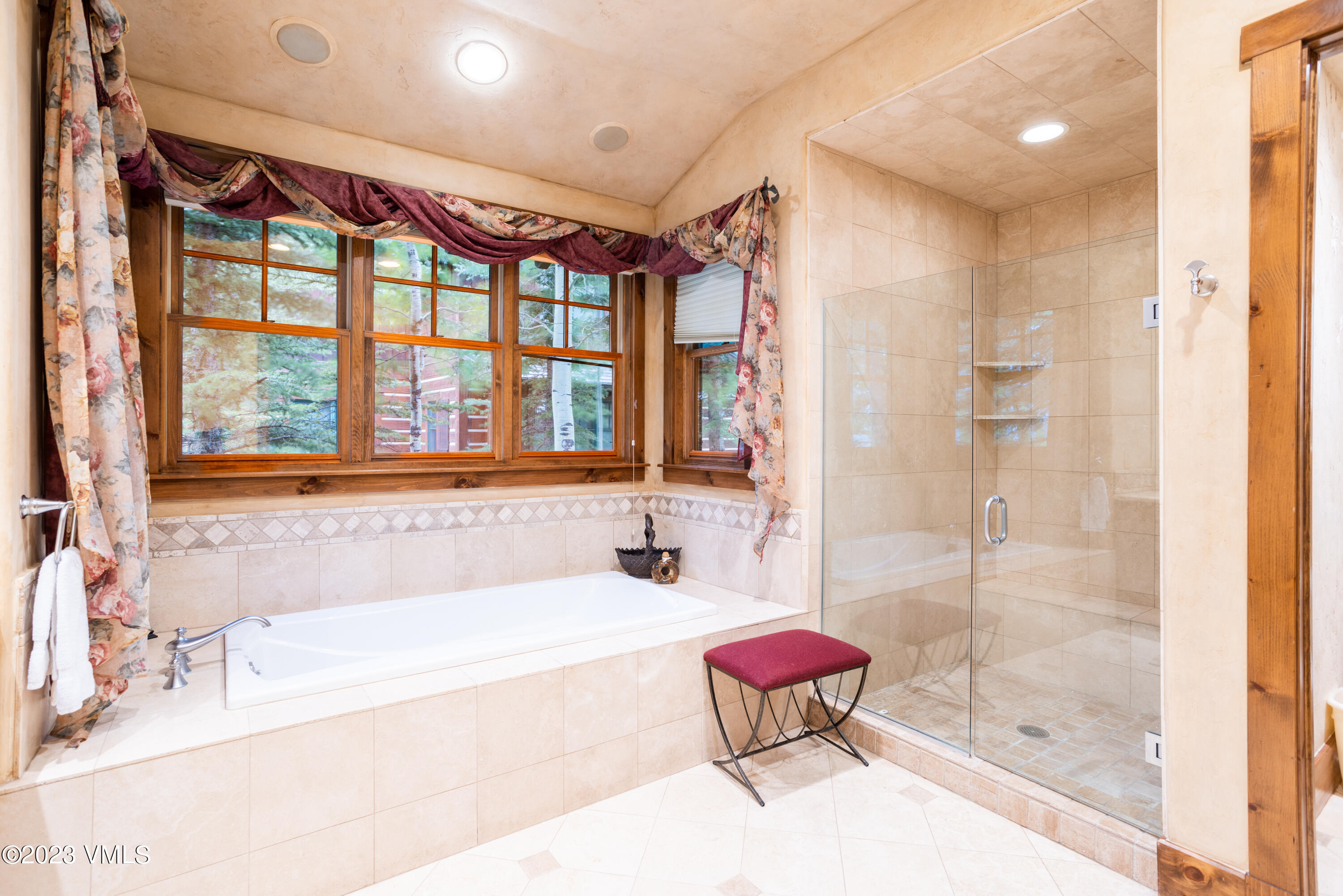 67 Cimarron Trail Edwards, CO 81632 - Photo 25 of 51 a bathroom with a bathtub and a shower