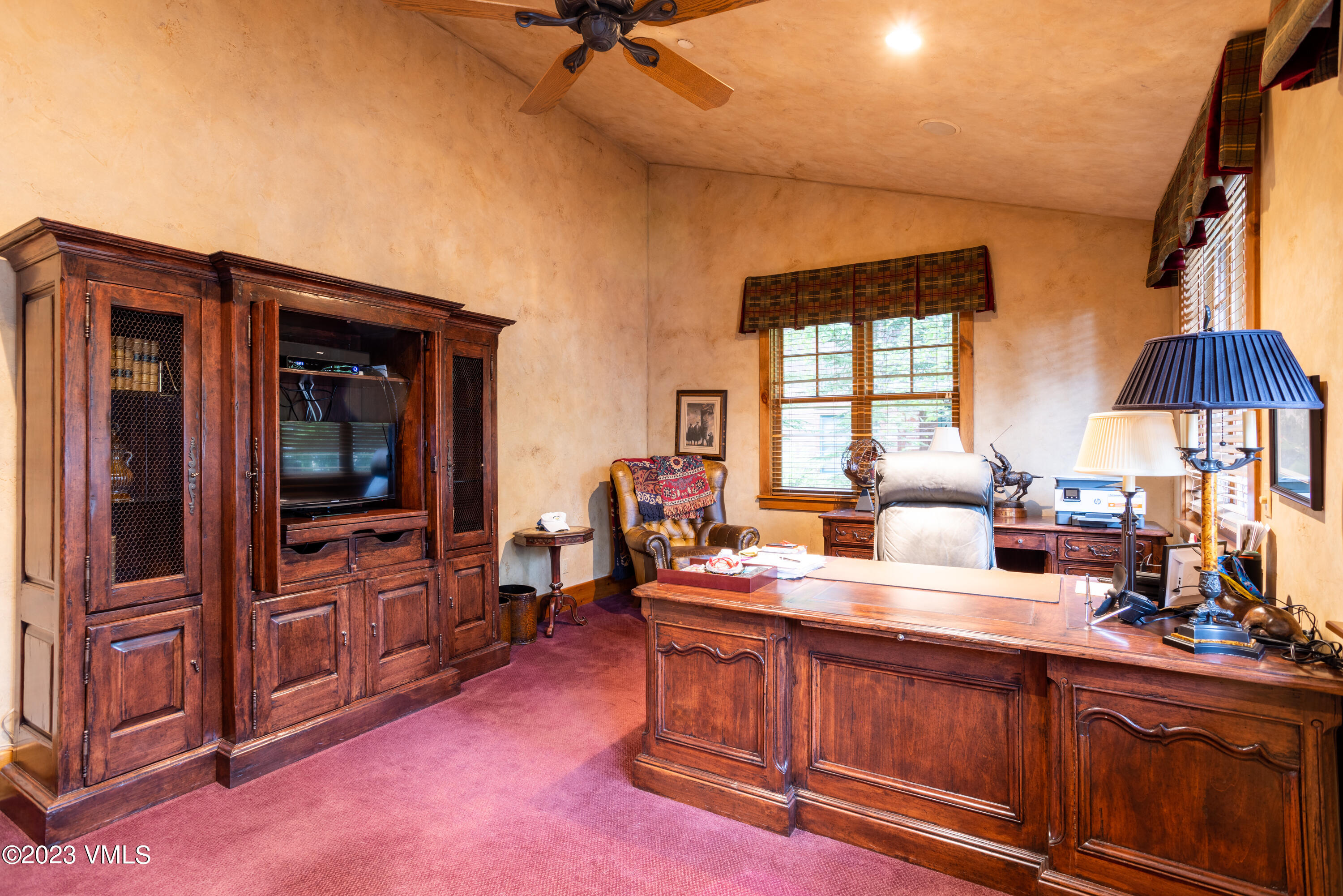 67 Cimarron Trail Edwards, CO 81632 - Photo 27 of 51 a room with furniture and a flat screen tv