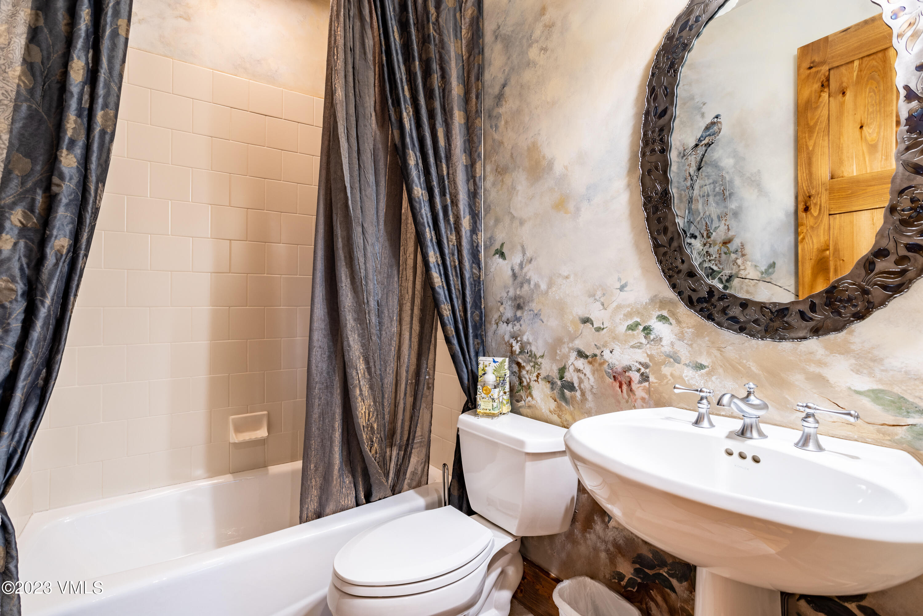 67 Cimarron Trail Edwards, CO 81632 - Photo 28 of 51 a bathroom with a sink and mirror with toilet