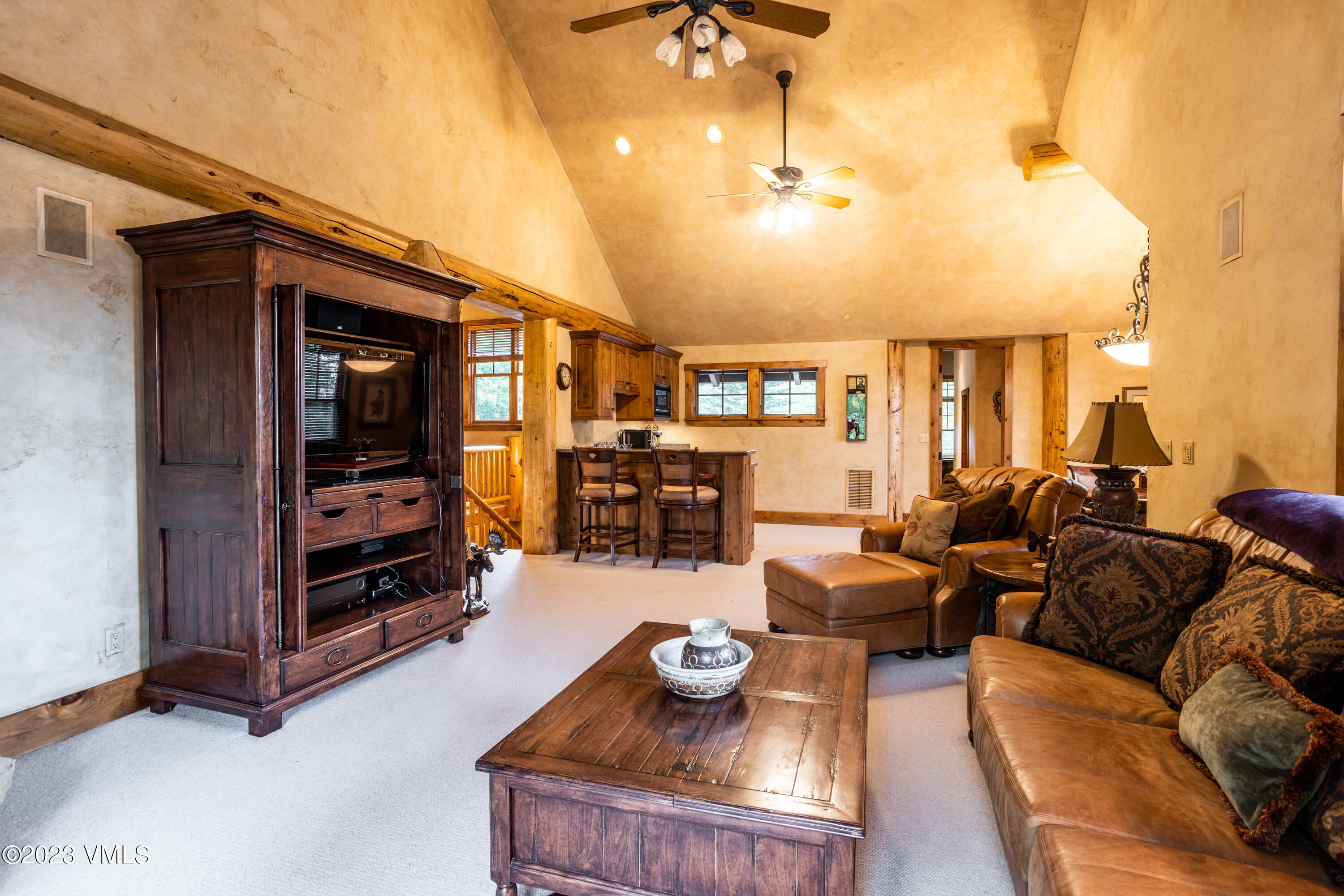 67 Cimarron Trail Edwards, CO 81632 - Photo 35 of 51 a living room with furniture and a flat screen tv