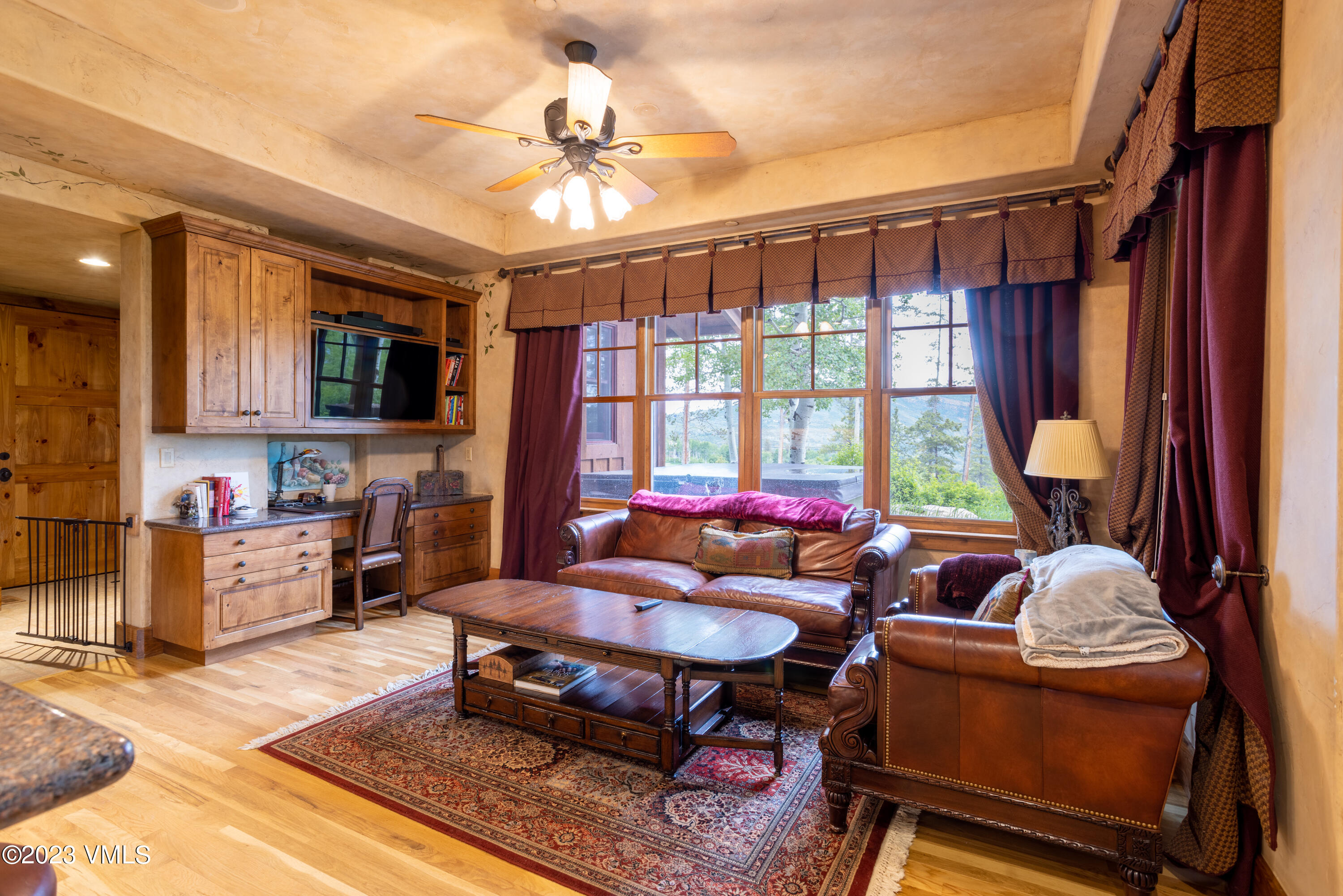 67 Cimarron Trail Edwards, CO 81632 - Photo 7 of 51 a living room with furniture a rug and a window