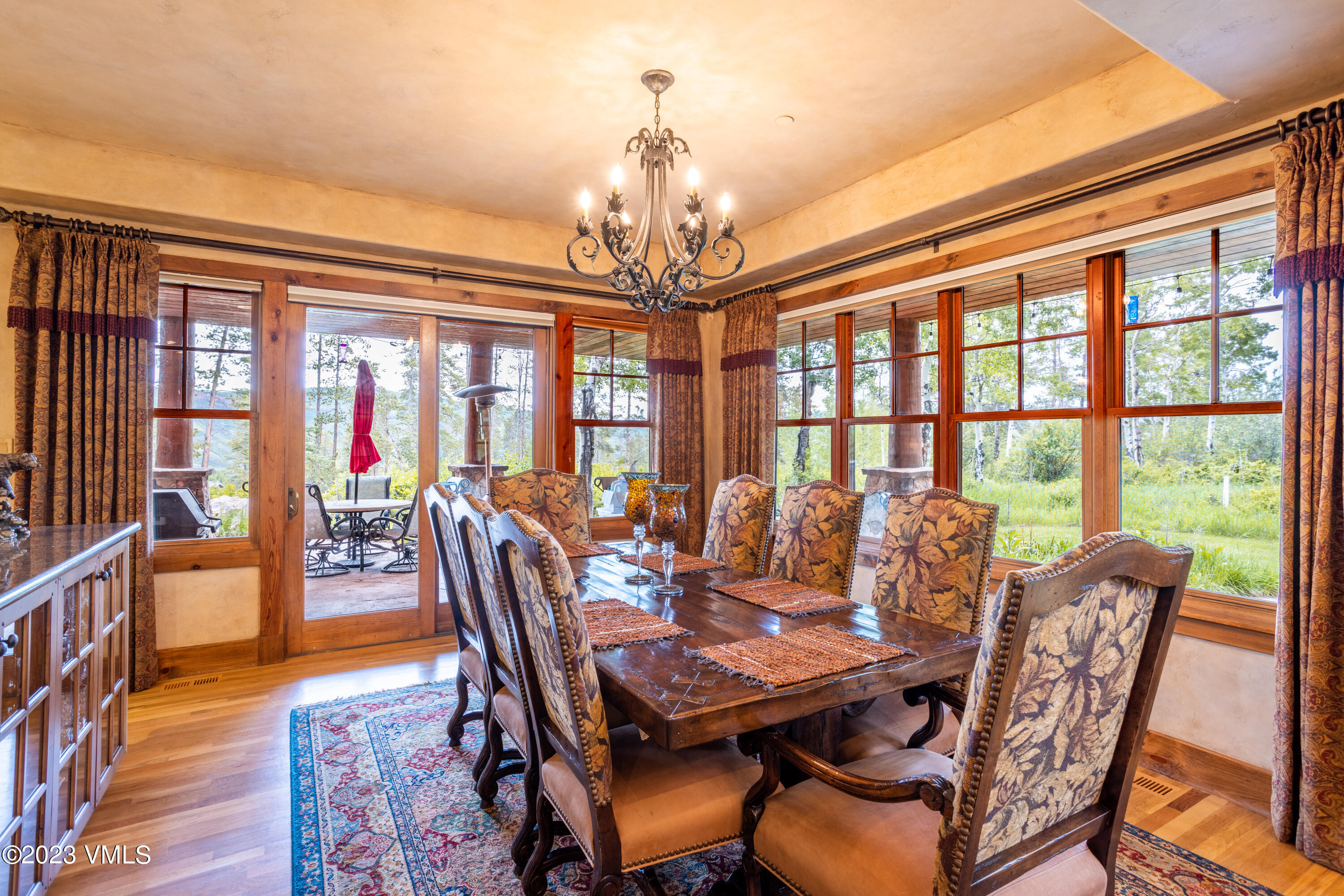 67 Cimarron Trail Edwards, CO 81632 - Photo 9 of 51 a view of a dining room with furniture window and wooden floor