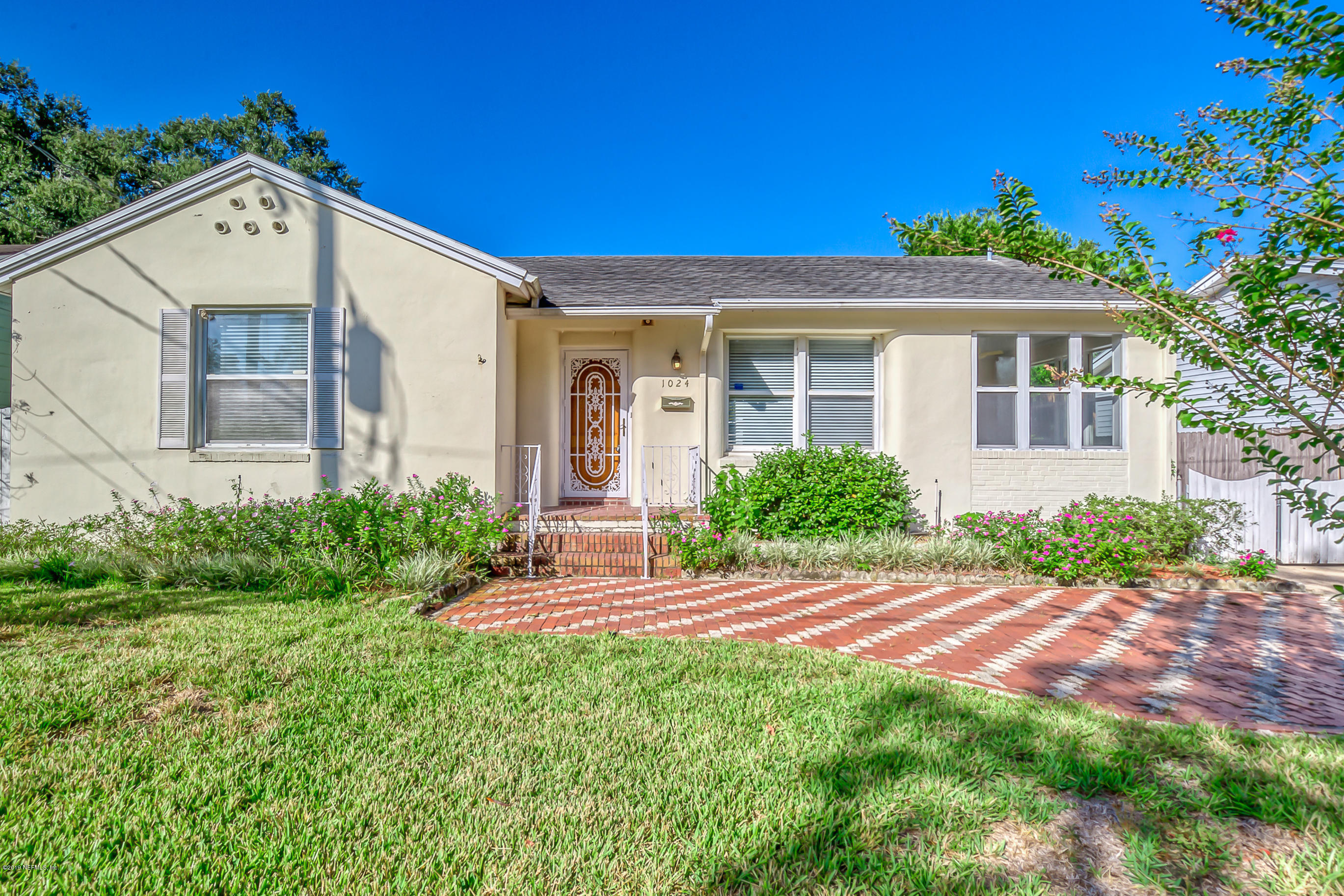 1024 Chatford Road Jacksonville, FL 32207 - Photo 1 of 22 a view of a house with a yard
