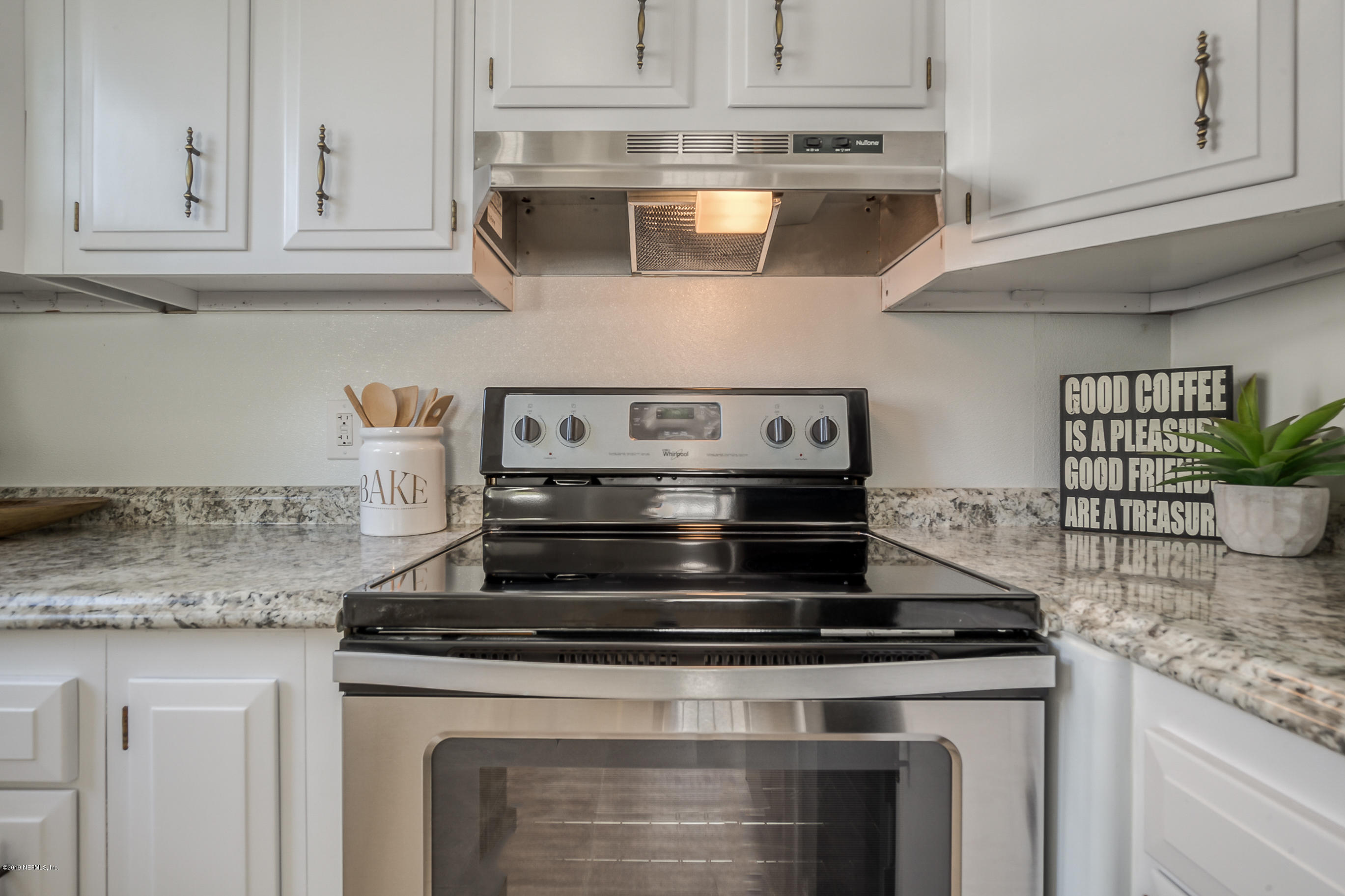 1024 Chatford Road Jacksonville, FL 32207 - Photo 12 of 22 a stove top oven sitting inside of a kitchen