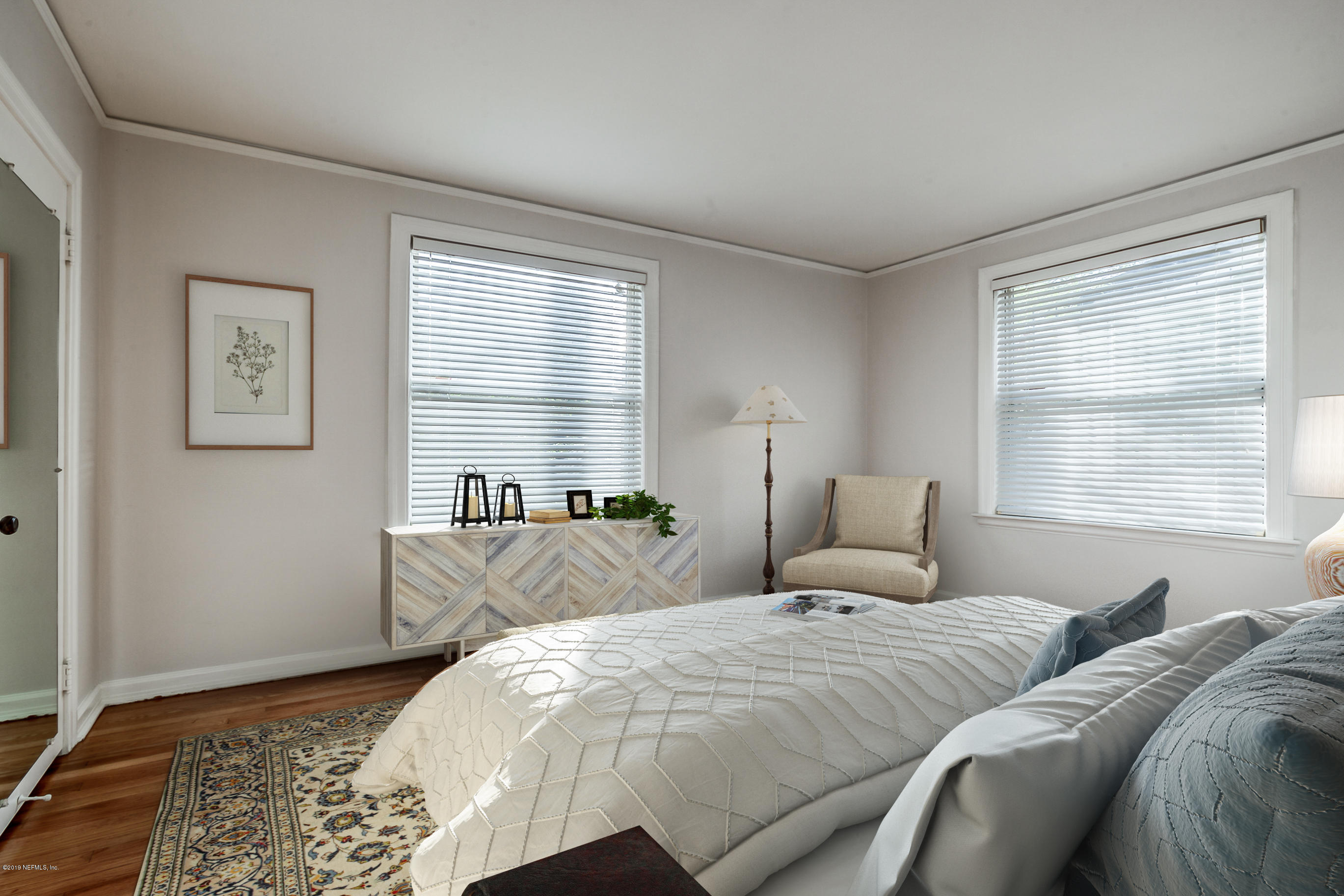 1024 Chatford Road Jacksonville, FL 32207 - Photo 5 of 22 a bedroom with two beds and a window