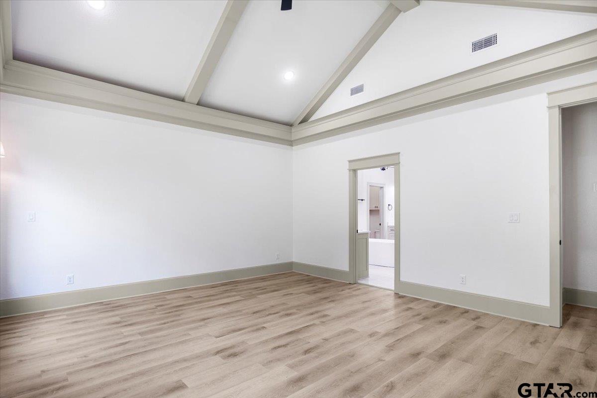 12336 Oak Grove Drive Lindale, TX 75706 - Photo 17 of 46 a view of an empty room with wooden floor