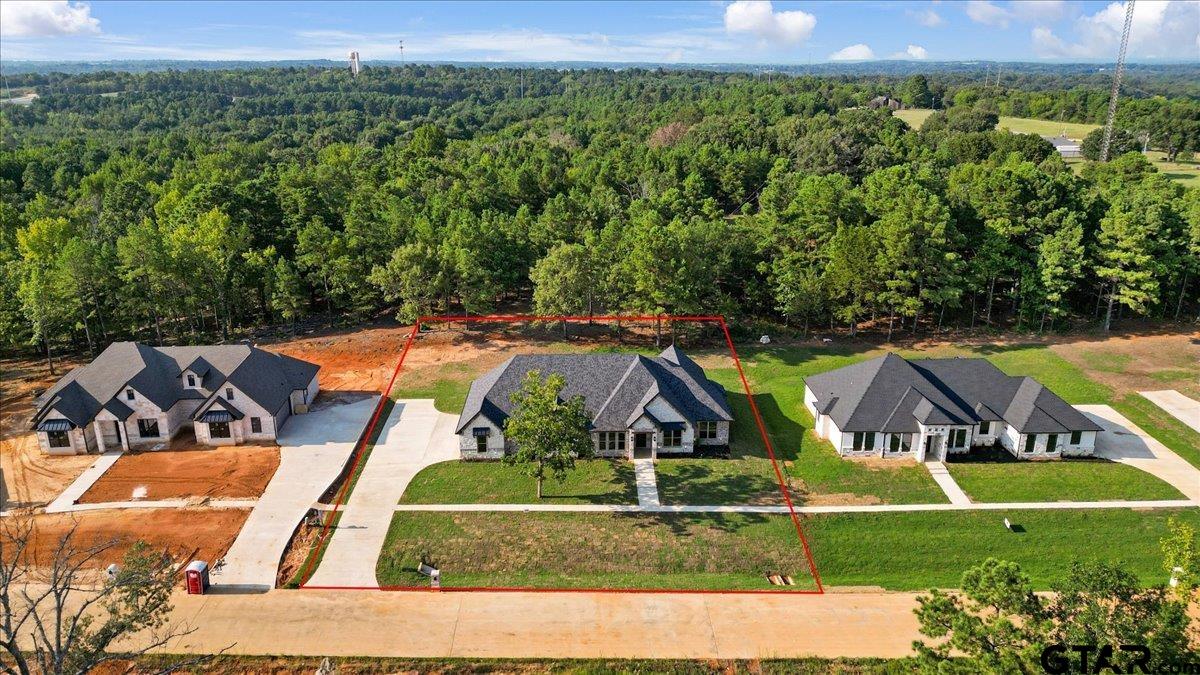 12336 Oak Grove Drive Lindale, TX 75706 - Photo 2 of 46 an aerial view of a house with a yard