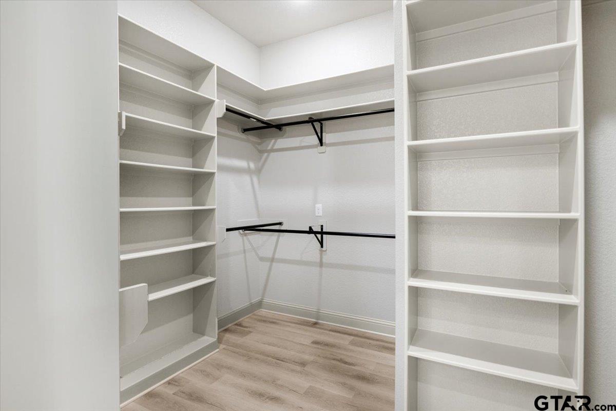 12336 Oak Grove Drive Lindale, TX 75706 - Photo 24 of 46 a view of an empty walk in closet