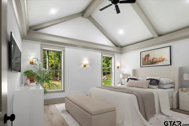 a bedroom with a balcony a bed and a couch