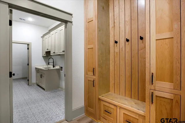 a view of a hallway with storage space