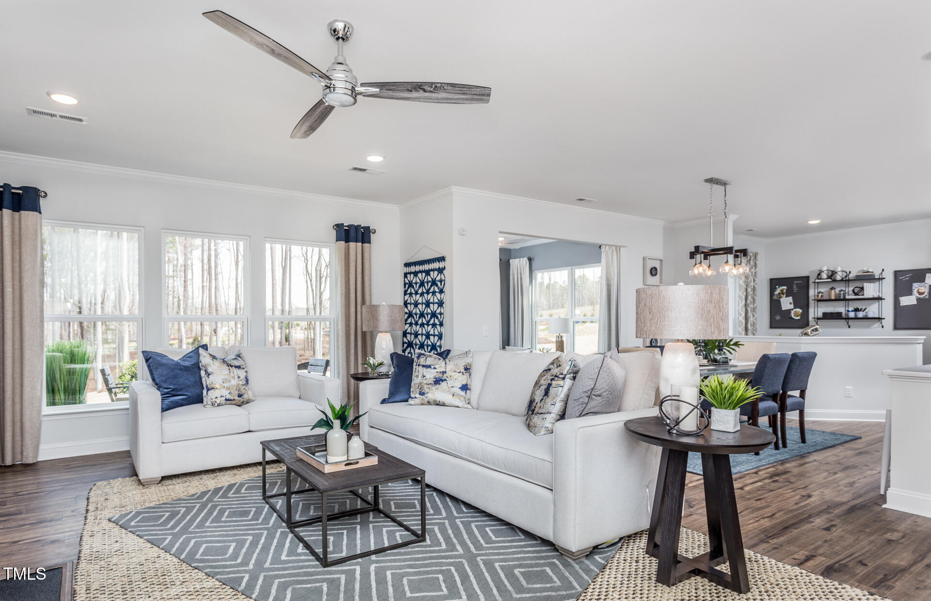 47 Rosedale Way Pittsboro, NC 27312 - Photo 6 of 15 a living room with furniture and a large window