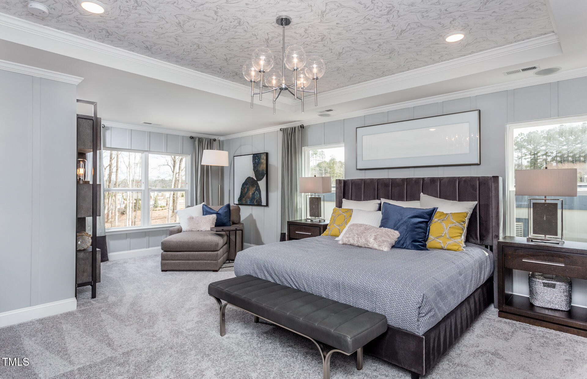 47 Rosedale Way Pittsboro, NC 27312 - Photo 10 of 15 a bedroom with a large bed and a chandelier