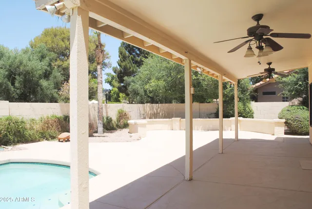a view of a hallway with a window