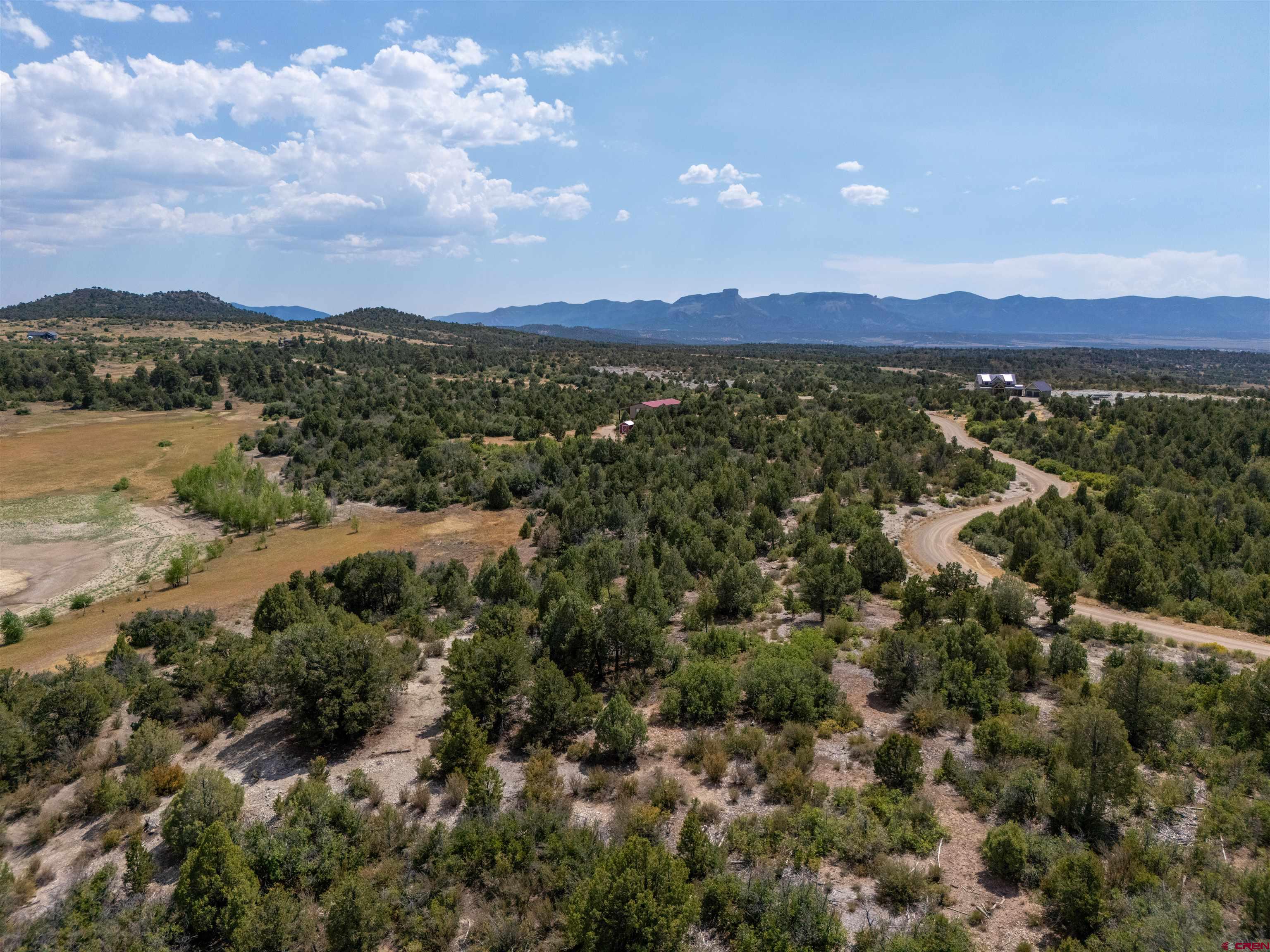 Lot 9 Road P2 Loop Mancos, CO 81328 - Photo 13 of 34 a view of a city with mountains in the background