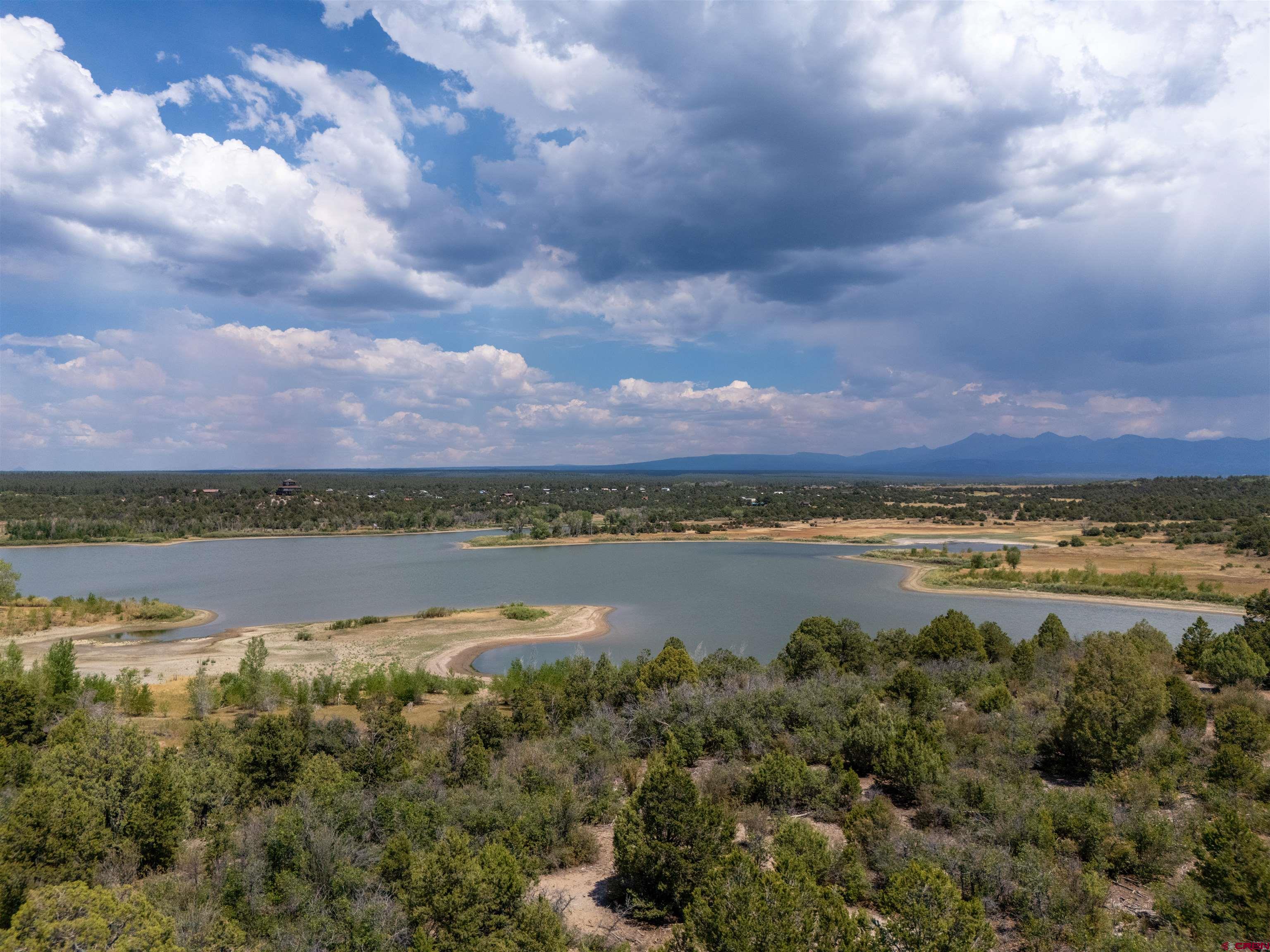 Lot 9 Road P2 Loop Mancos, CO 81328 - Photo 3 of 34 a view of a lake and mountain