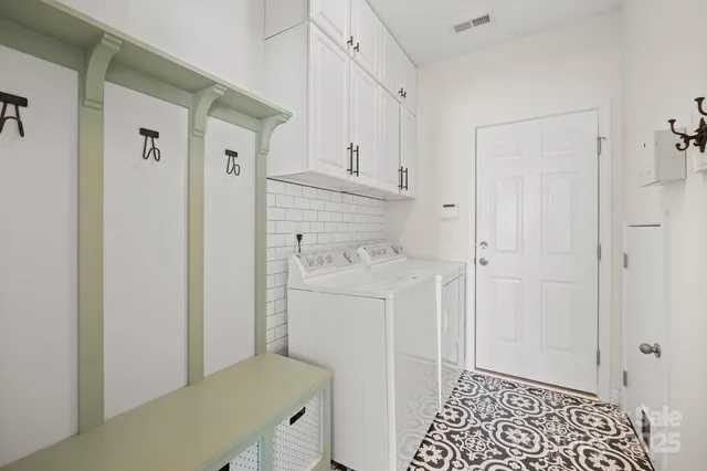 a room view with a wooden door