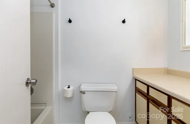 a bathroom with a toilet