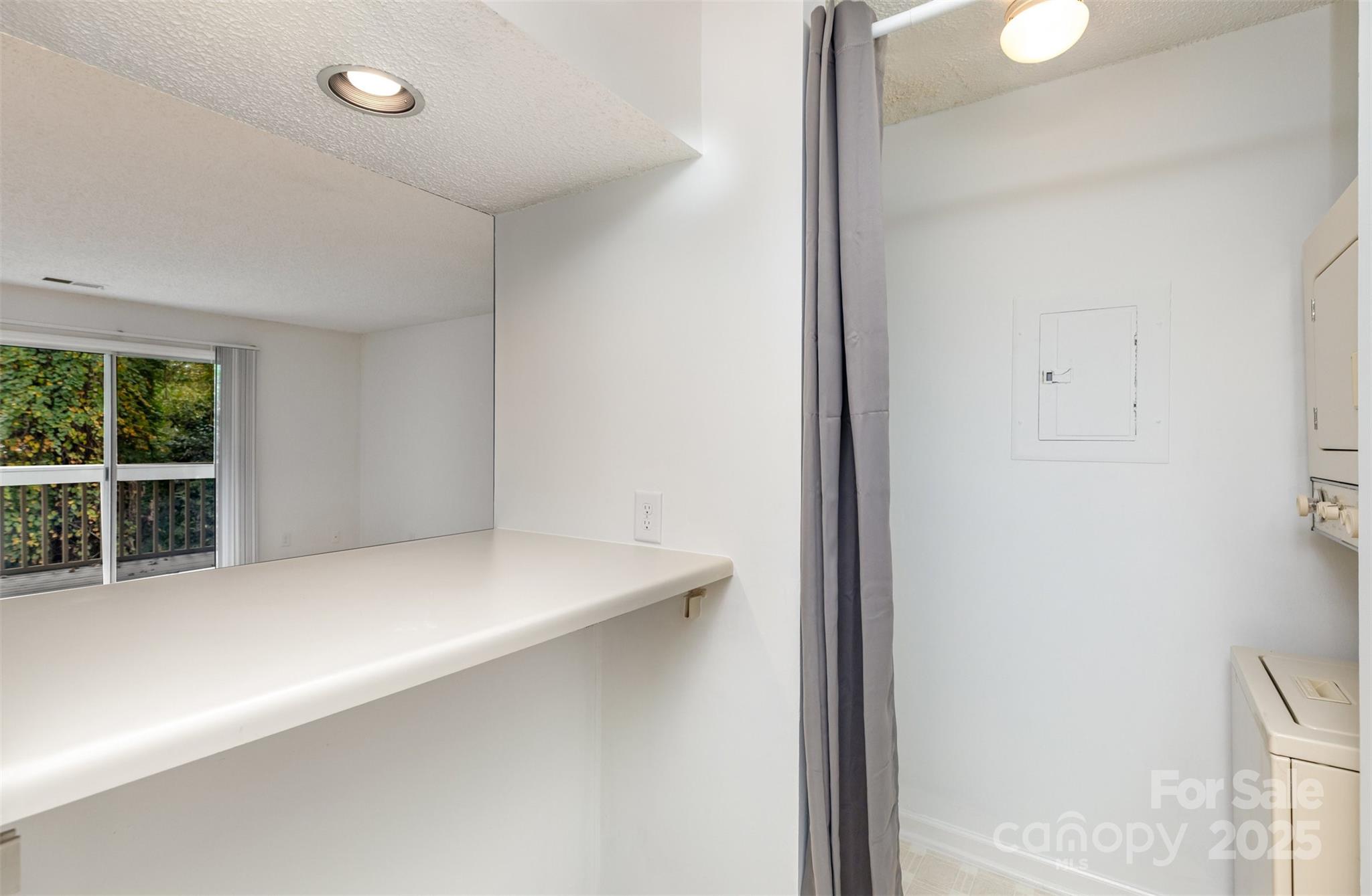 1021 Churchill Downs Court, Unit G Charlotte, NC 28211 - Photo 24 of 37 a view of an empty room with a window