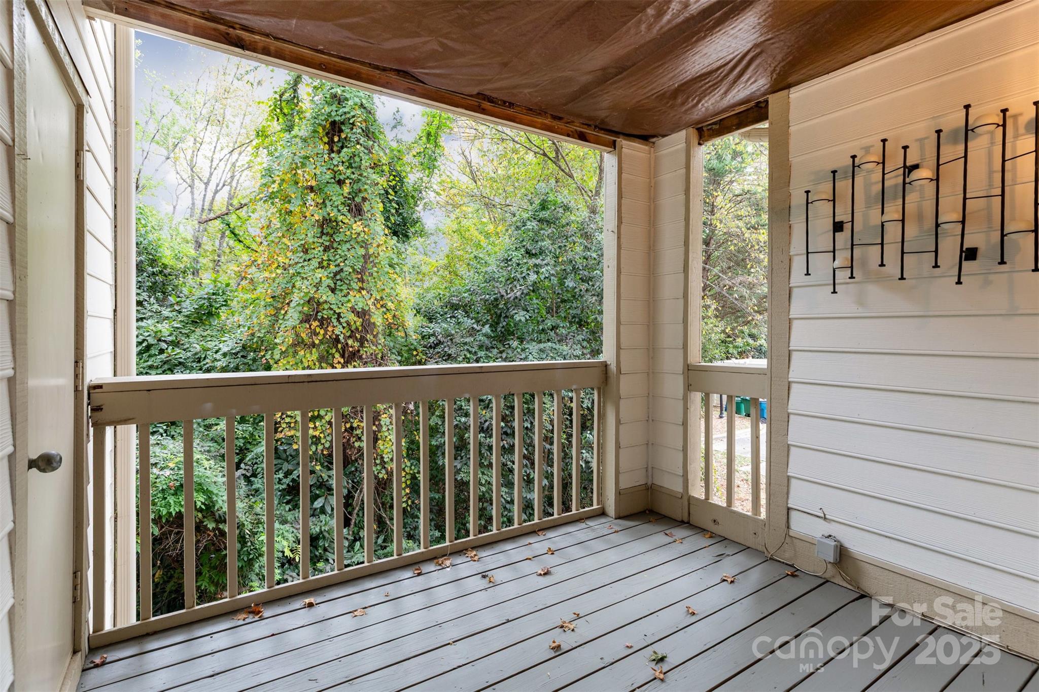 1021 Churchill Downs Court, Unit G Charlotte, NC 28211 - Photo 26 of 37 a view of wooden balcony with outdoor space