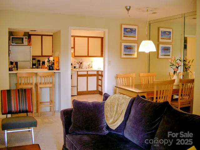 a chairs and a table in a balcony