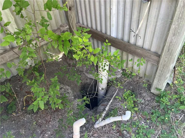 a view of a yard with an trees