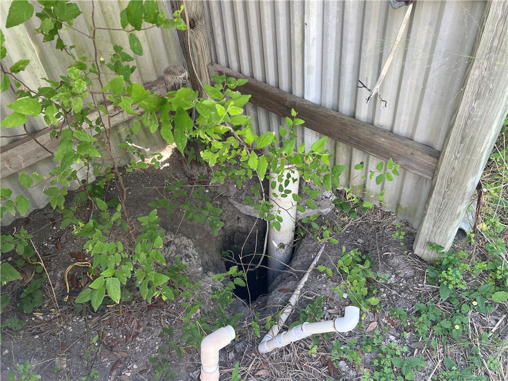 509 County Road 509 Mathis, TX 78368 - Photo 5 of 9 a view of a backyard with plants