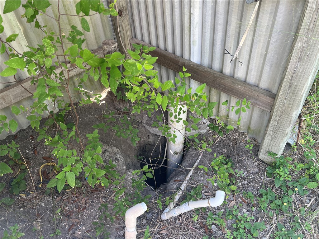 509 County Road 509 Mathis, TX 78368 - Photo 6 of 9 a view of a backyard with plants