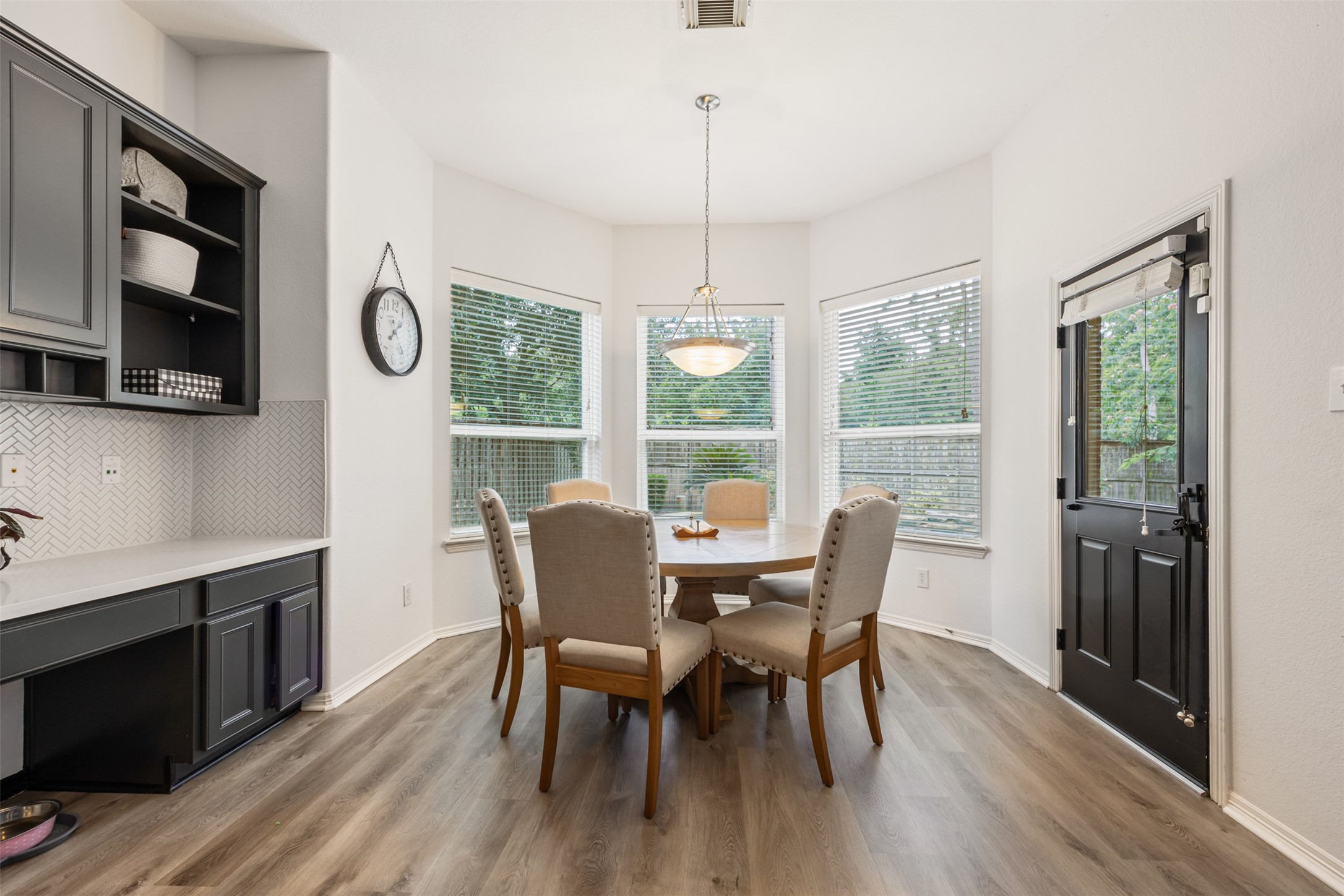 58 South Longsford Circle Spring, TX 77382 - Photo 28 of 50 a view of a dining room with furniture window and wooden floor