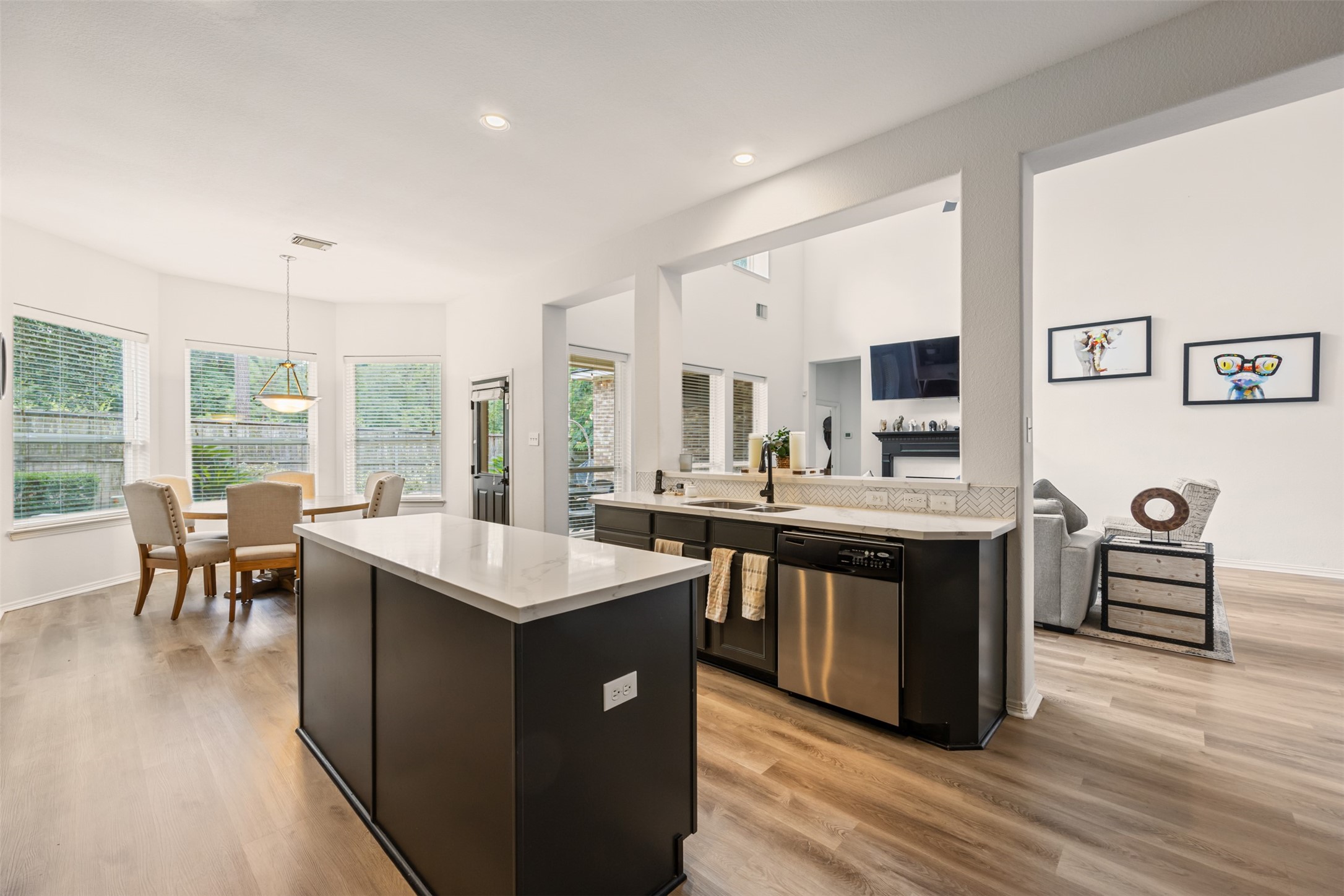 58 South Longsford Circle Spring, TX 77382 - Photo 30 of 50 a open kitchen with stainless steel appliances granite countertop a sink and stove